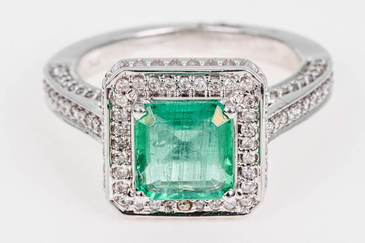 14CT White Gold Emerald and Diamond Ring. 1.80ct Emerald cut emerald